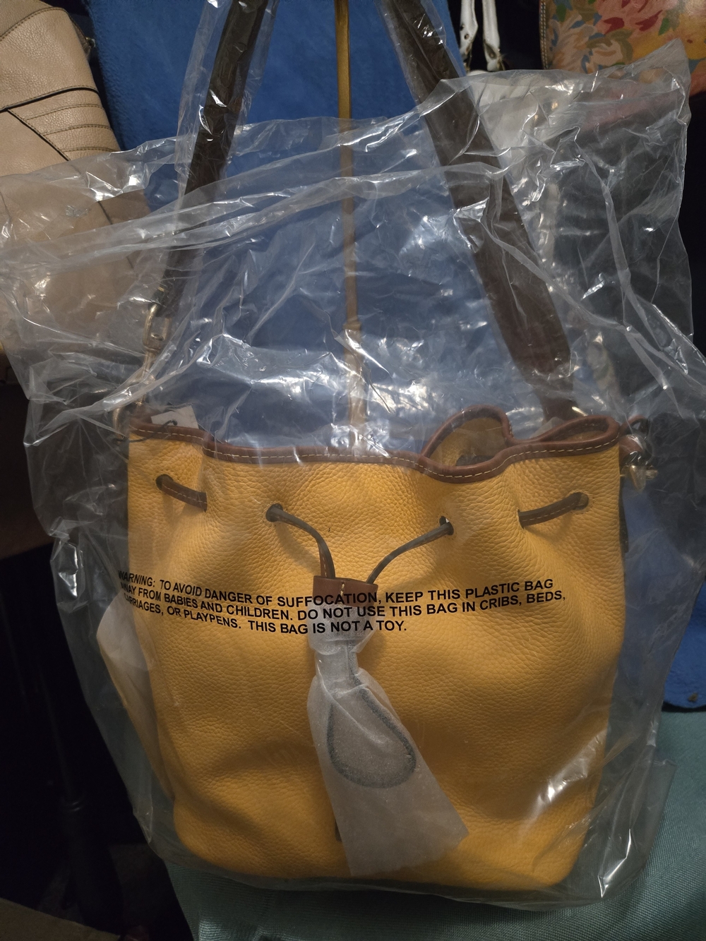 Dooney & Bourke Mustard Yellow Leather Drawstring Hobo with Dark Brown Straps